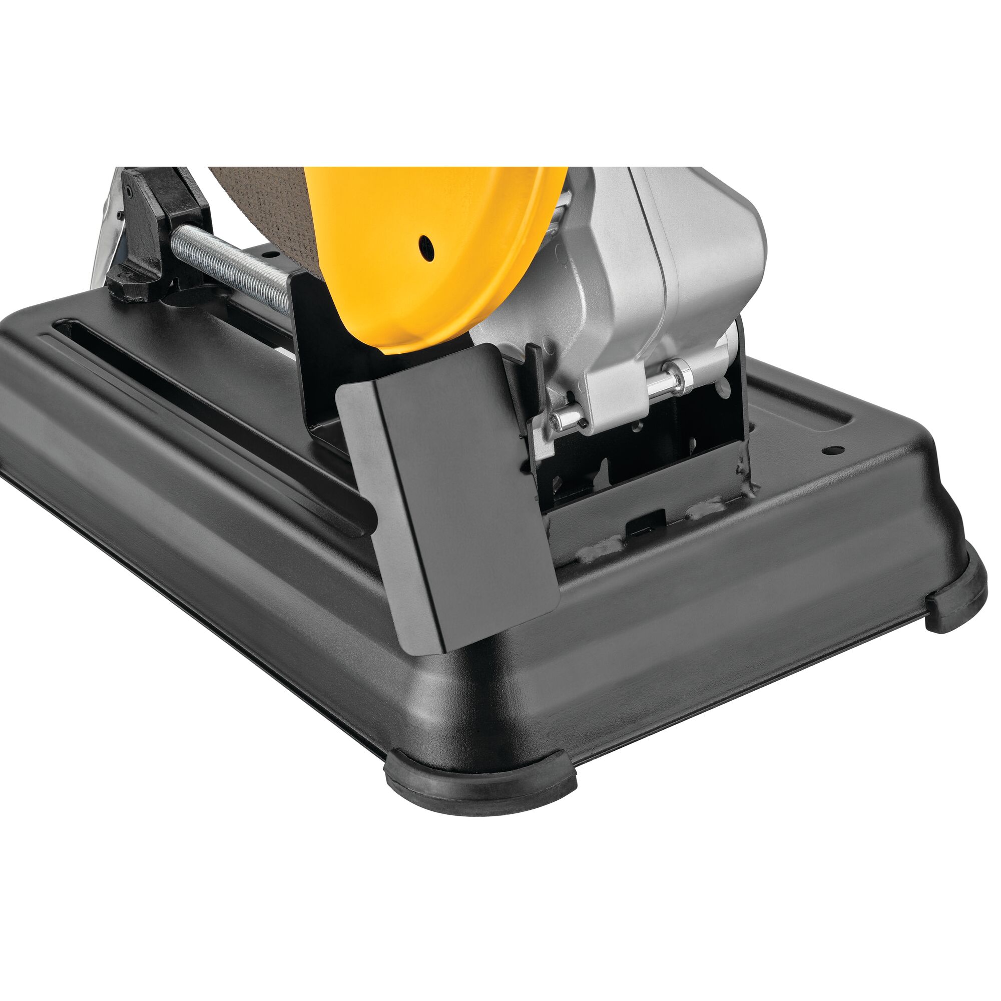 Close-up of the base and cutting guard of a DEWALT metal cutting saw, showing the robust black platform and yellow guard.