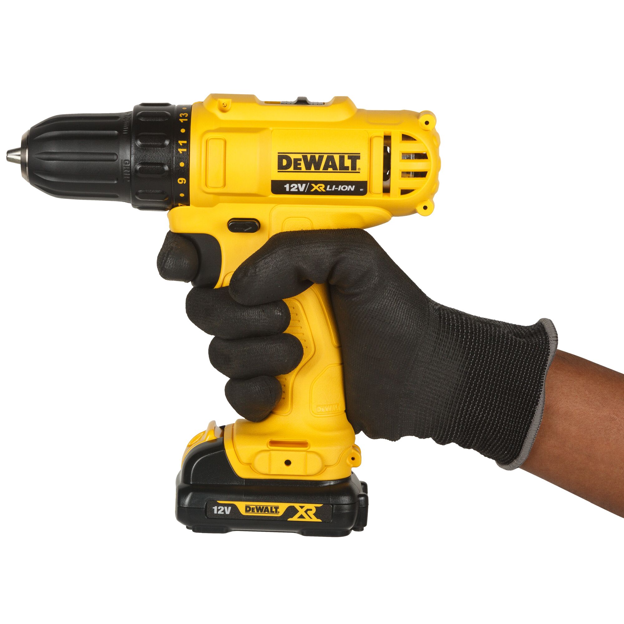 A person wearing a black glove is holding a yellow DEWALT 12V XR Li-Ion cordless drill against a white background.