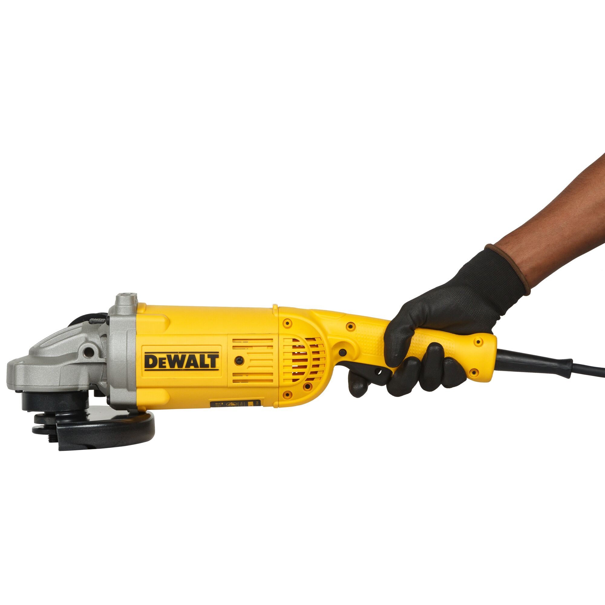 A person wearing a black glove is holding a DEWALT yellow power tool, specifically an angle grinder, against a white background.