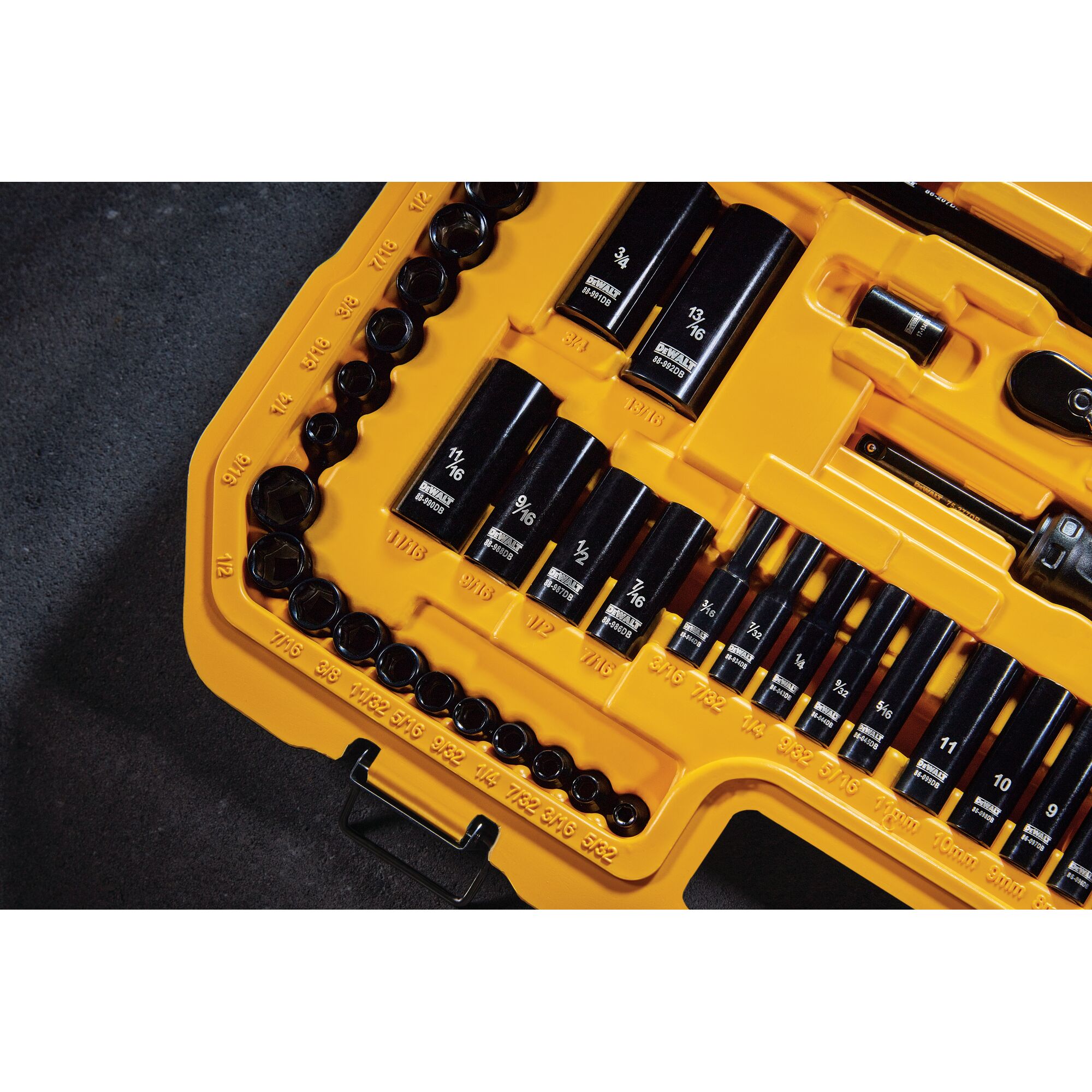 Close-up image of a DEWALT socket set in a yellow plastic case, showing various black sockets organized by size and clearly labeled with measurement markings.