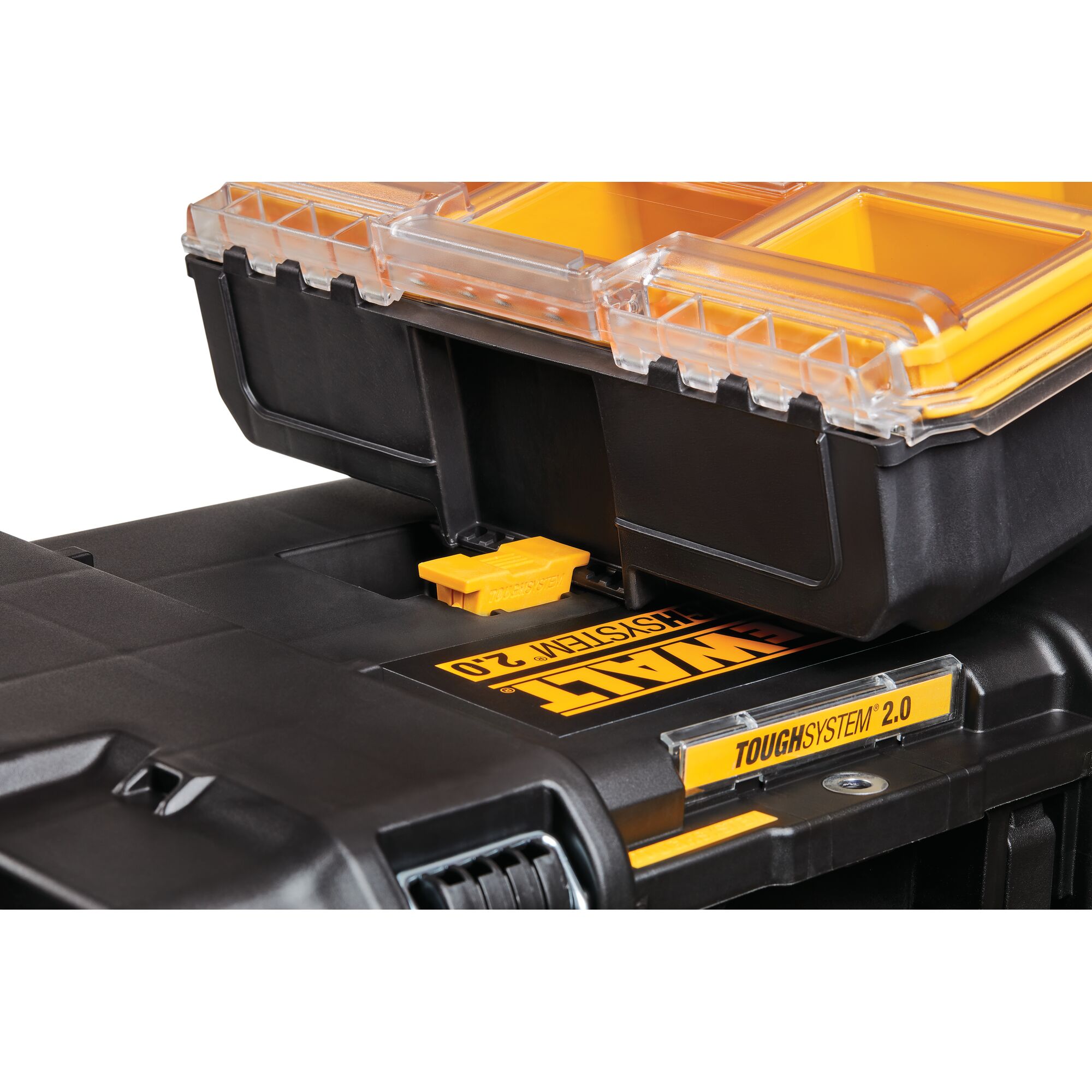 Close-up of a DEWALT ToughSystem 2.0 organizer container with a transparent lid and yellow compartments, stacked and securely latch-locked on another black toolbox.